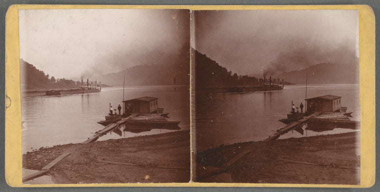 Ferry and barge on the river, and people at a dock next to house, Ohio