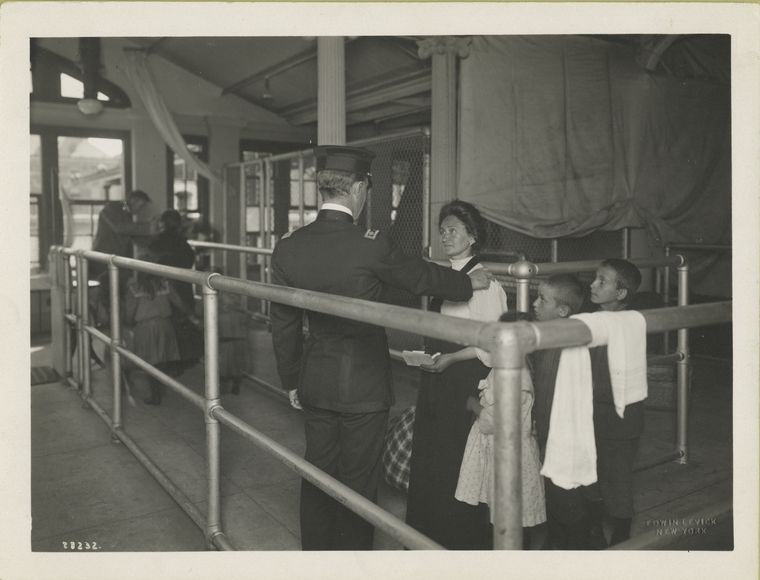 Immigrants undergoing medical examination.