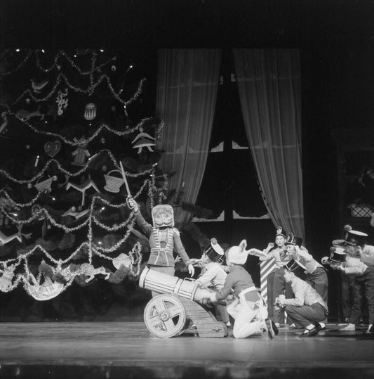The Nutcracker leads toy soldiers in fight with big mice, in a New York City Ballet production of "The Nutcracker."