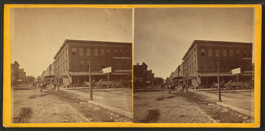 People in front of a meat store, Davenport, Iowa.