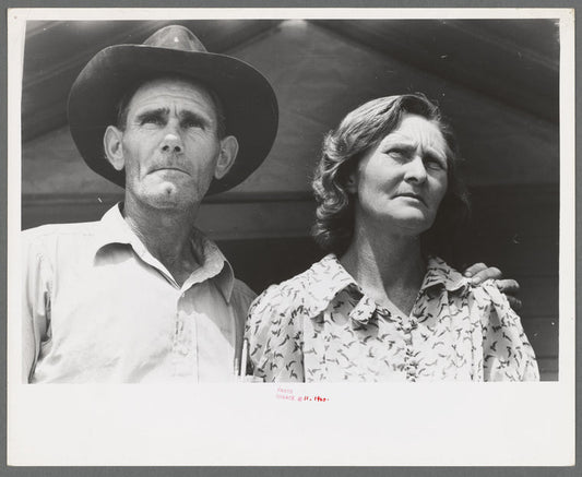 Migratory laborer and his wife at the Agua Fria Migratory Labor Camp, Arizona