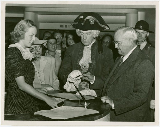 Washington (State) Participation - Harvey Gibson and man in George Washington costume signing guestbook